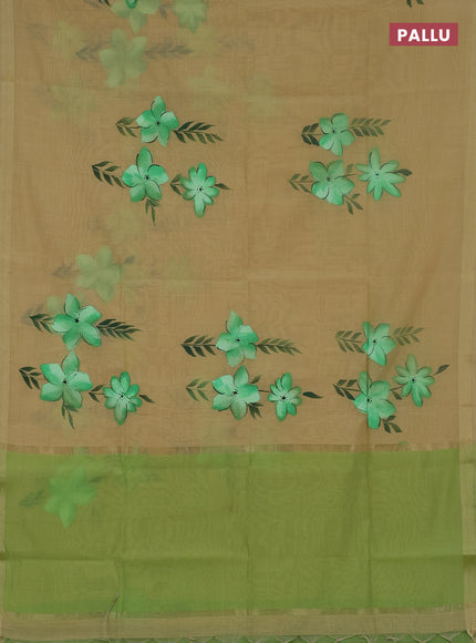 Linen cotton saree sandal and light green with floral hand paint prints and zari woven border