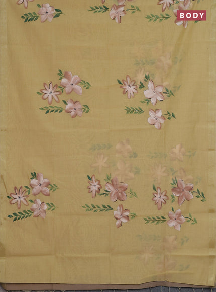 Linen cotton saree sandal and dark beige with floral hand paint prints and zari woven border