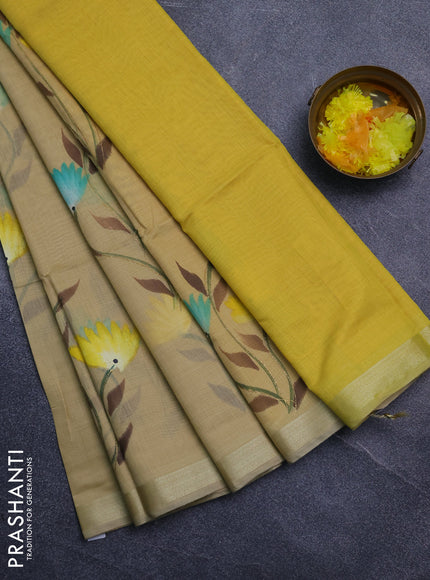 Linen cotton saree sandal and yellow with floral hand paint prints and zari woven border