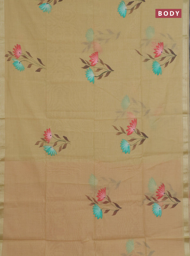 Linen cotton saree sandal and peach shade with floral hand paint prints and zari woven border