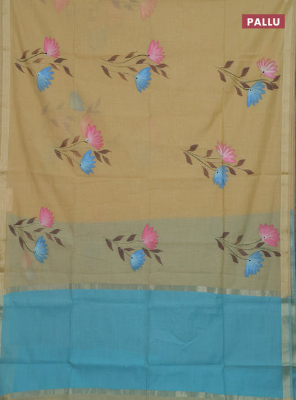 Linen cotton saree sandal and teal blue with floral hand paint prints and zari woven border
