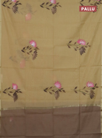 Linen cotton saree sanda and dark beige with floral hand paint prints and zari woven border