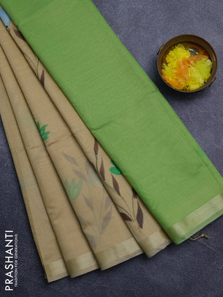 Linen cotton saree sandal and light green with floral hand paint prints and zari woven border