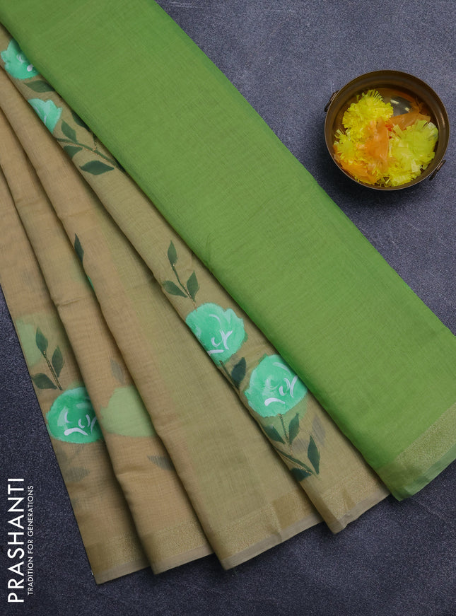 Linen cotton saree sandal and light green with floral hand paint prints and zari woven border
