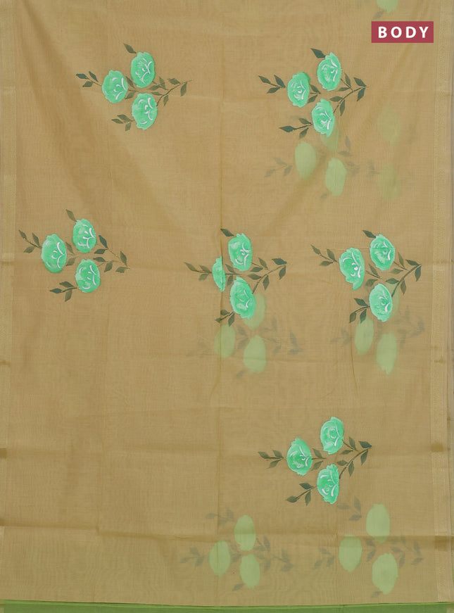 Linen cotton saree sandal and light green with floral hand paint prints and zari woven border