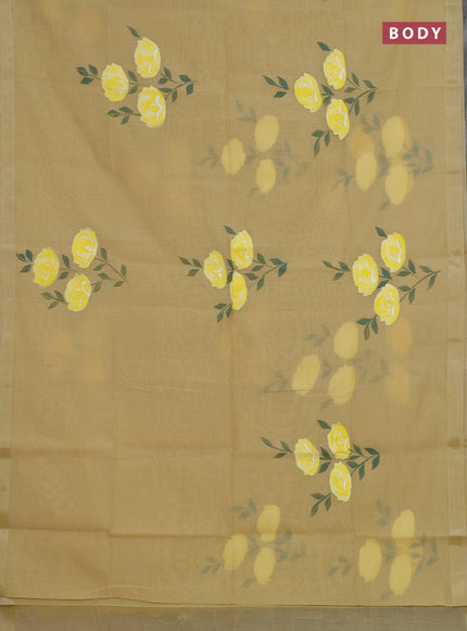 Linen cotton saree sandal and yellow with floral hand paint prints and zari woven border