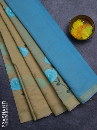 Linen cotton saree sandal and teal blue with floral hand paint prints and zari woven border