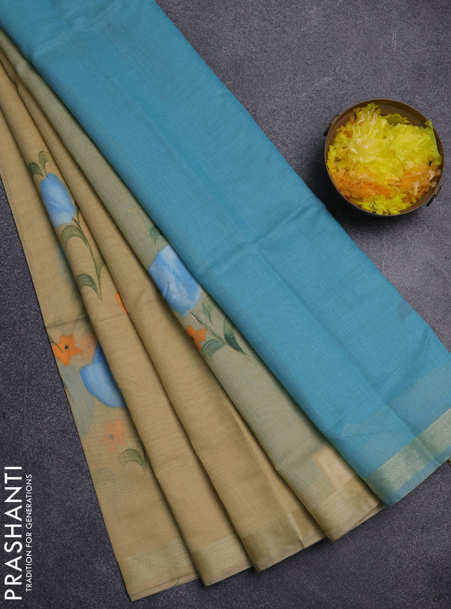 Linen cotton saree sandal and teal blue with floral hand paint prints and zari woven border