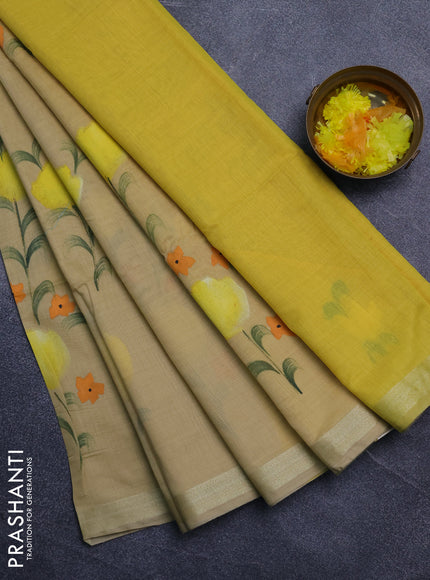 Linen cotton saree sandal and yellow with floral hand paint prints and zari woven border