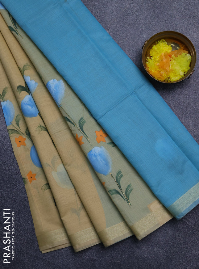 Linen cotton saree sandal and teal blue with floral hand paint prints and zari woven border