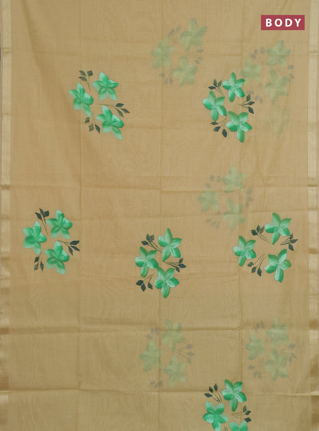 Linen cotton saree sandal and light green with floral hand paint prints and zari woven border