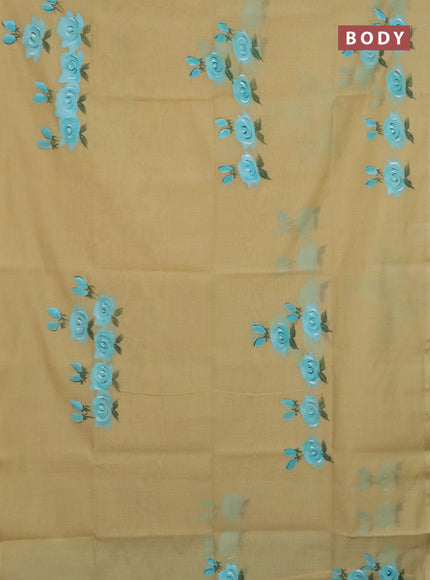 Linen cotton saree sandal and teal blue with floral hand paint prints and zari woven border