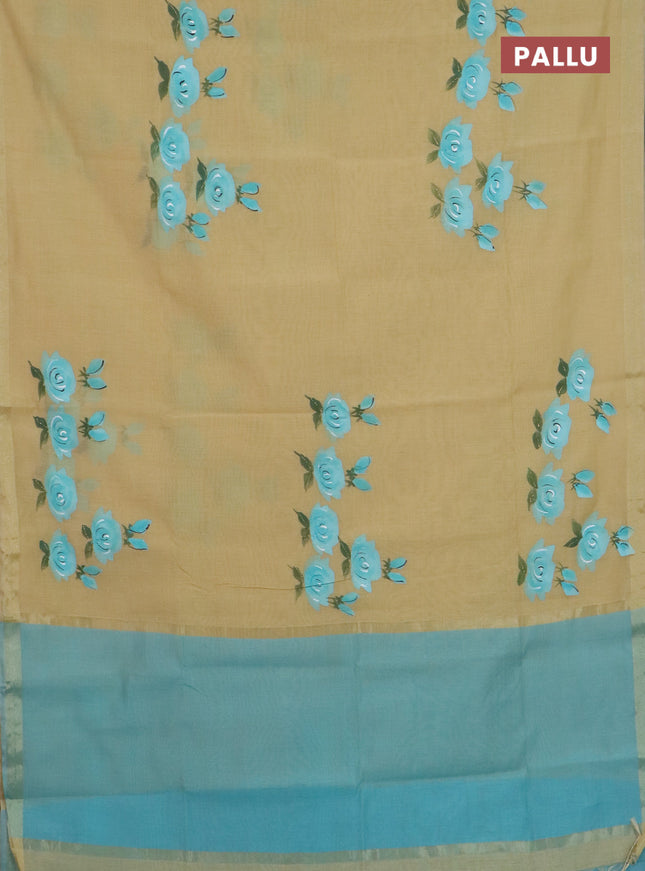 Linen cotton saree sandal and teal blue with floral hand paint prints and zari woven border