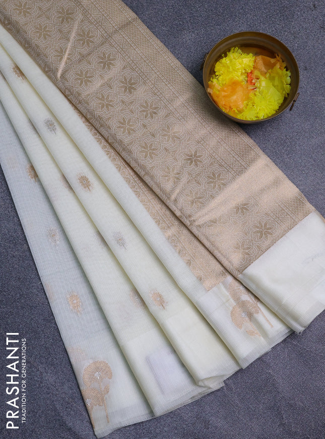 Art kota saree off white with zari woven buttas and zari woven floral butta border