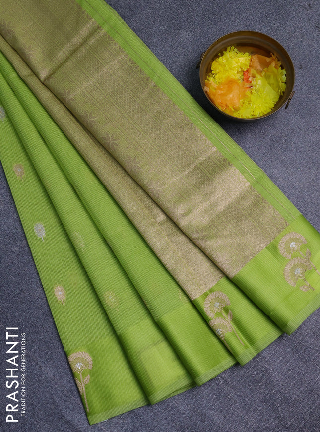 Art kota saree light green with zari woven buttas and zari woven floral butta border
