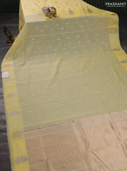 Art kota saree pale yellow with zari woven buttas and zari woven floral butta border