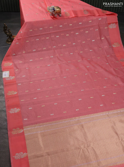 Art kota saree peach shade with zari woven buttas and zari woven floral butta border