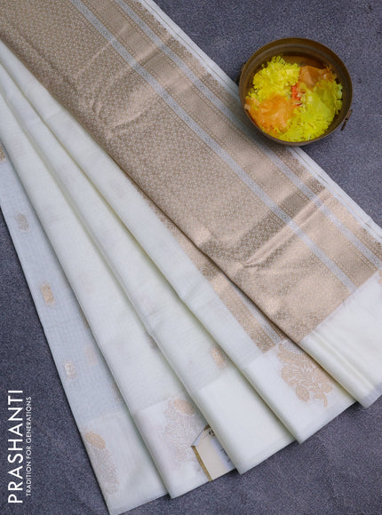 Art kota saree cream with zari woven buttas and zari woven floral butta border