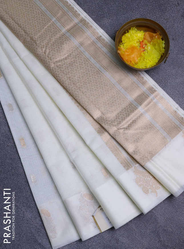 Art kota saree cream with zari woven buttas and zari woven floral butta border