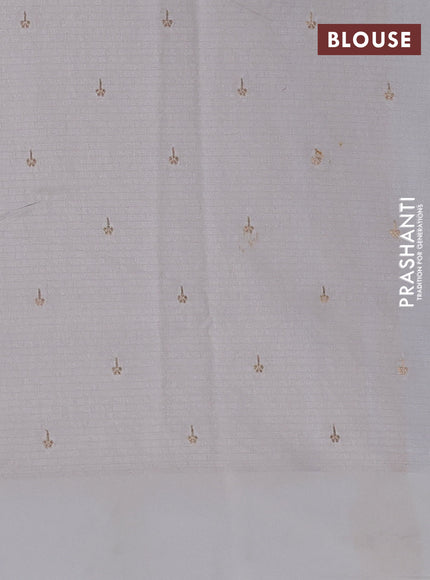 Art kota saree cream with zari woven buttas and zari woven floral butta border