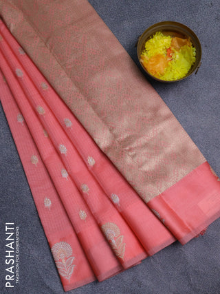 Art kota saree peach shade with zari woven floral buttas and zari woven floral butta border