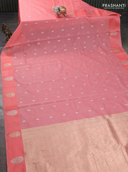Art kota saree peach shade with zari woven floral buttas and zari woven floral butta border