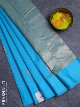 Art kota saree light blue with zari woven floral buttas and satin border