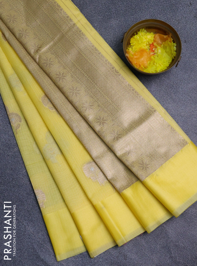 Art kota saree pale yellow with zari woven floral buttas and satin border