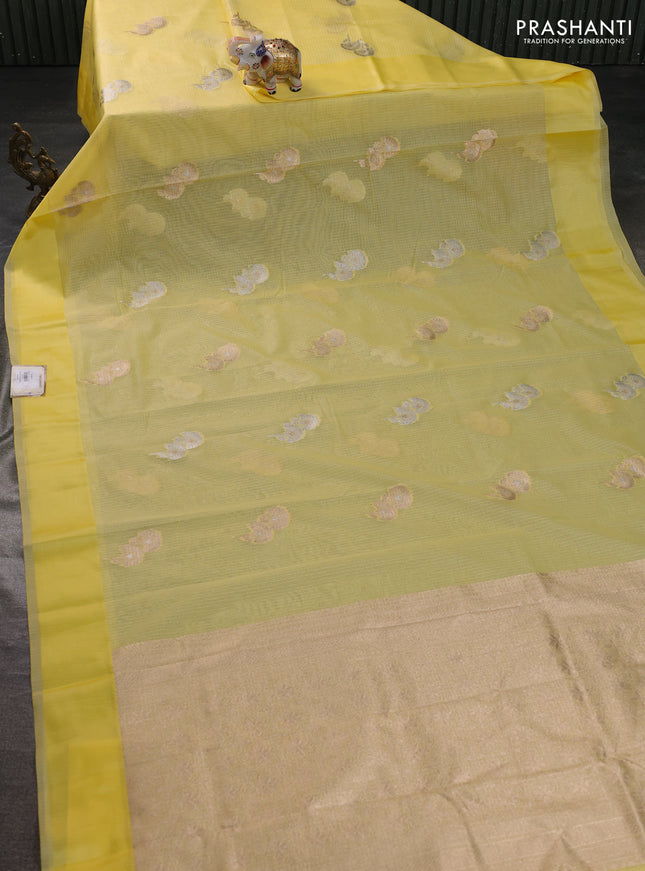Art kota saree pale yellow with zari woven floral buttas and satin border