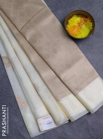 Art kota saree cream with zari woven floral buttas and satin border