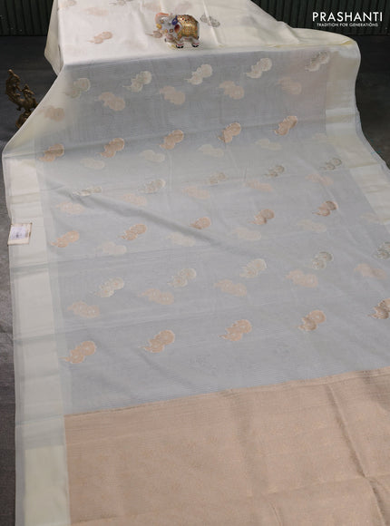 Art kota saree cream with zari woven floral buttas and satin border
