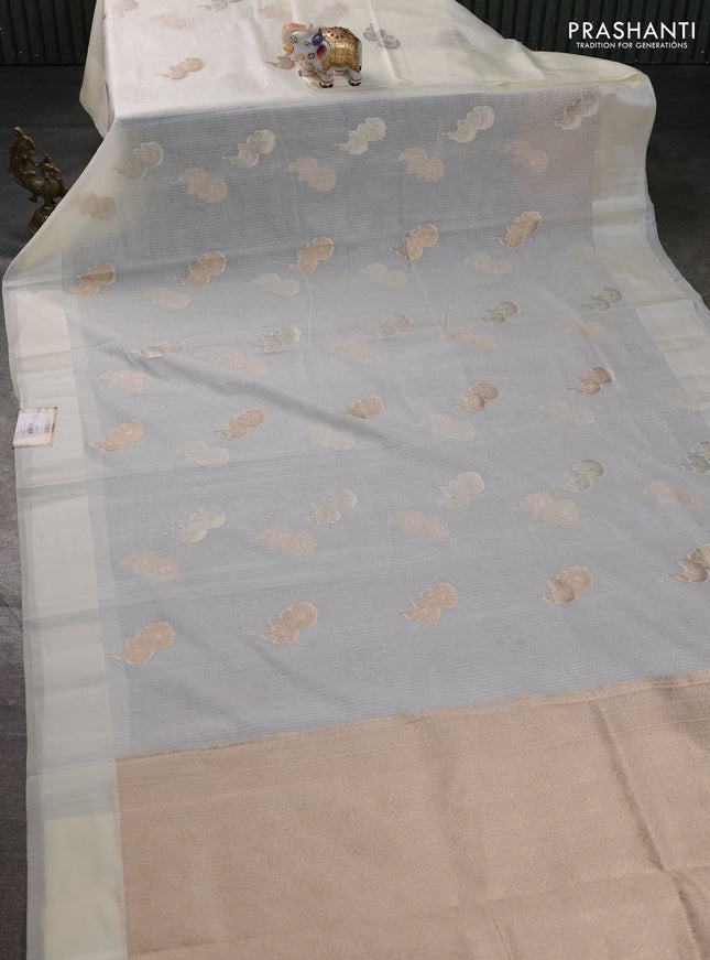 Art kota saree cream with zari woven floral buttas and satin border