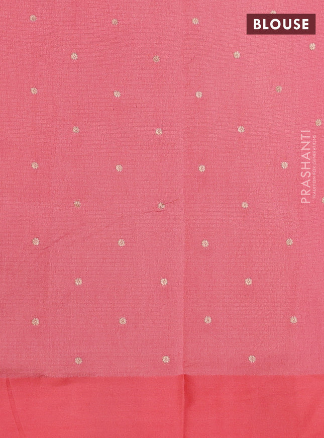 Art kota saree peach shade with allover zari woven buttas and zari woven butta border