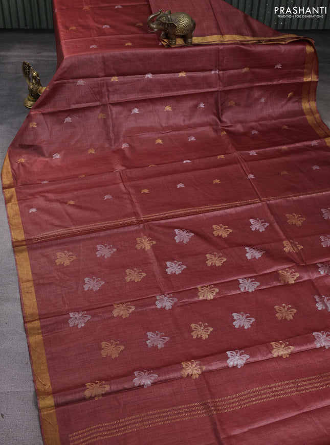 Banana silk saree rust shade with silver & zari woven buttas and zari woven border
