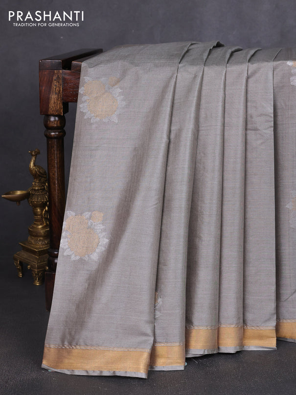 Banana silk saree grey and rust shade with silver & zari woven buttas and zari woven border