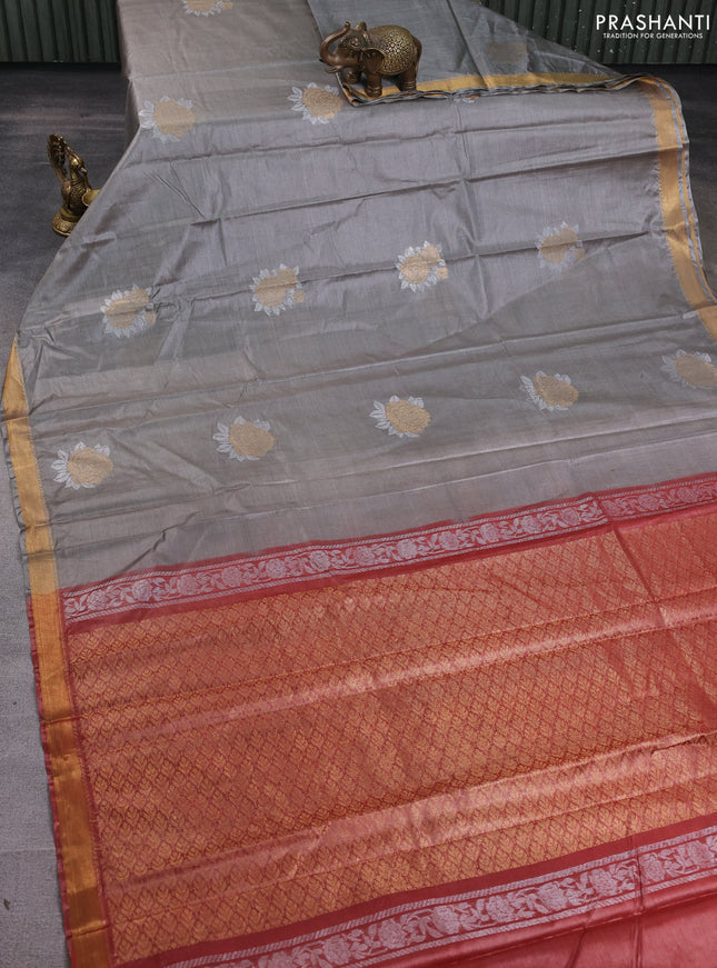 Banana silk saree grey and rust shade with silver & zari woven buttas and zari woven border