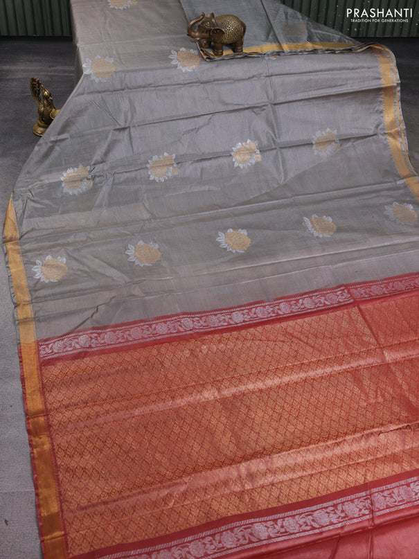 Banana silk saree grey and rust shade with silver & zari woven buttas and zari woven border
