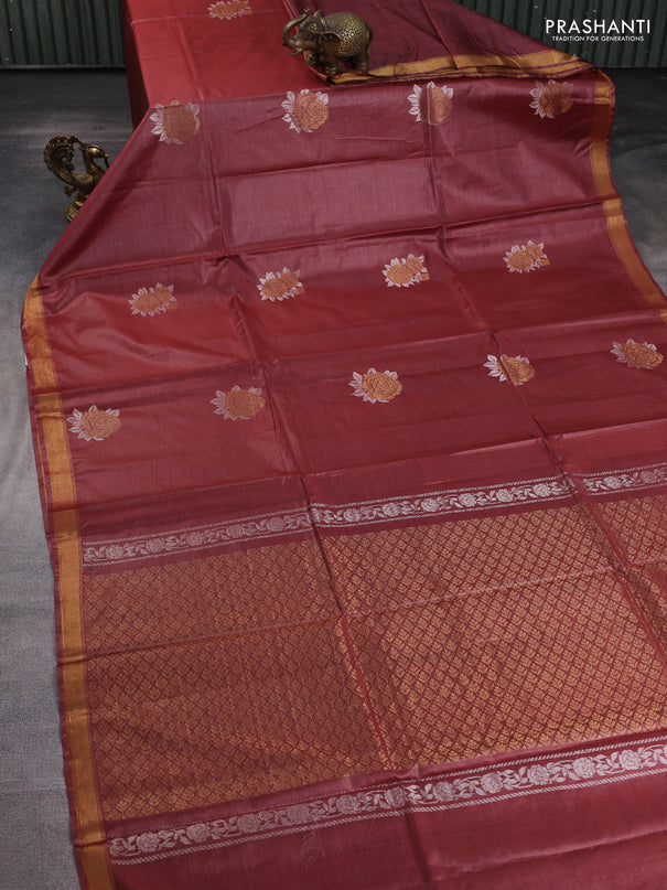 Banana silk saree rust shade with silver & zari woven buttas and zari woven border