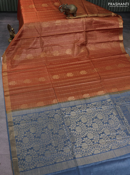 Banana silk saree rust shade and blue with allover zari stripe pattern and zari woven border