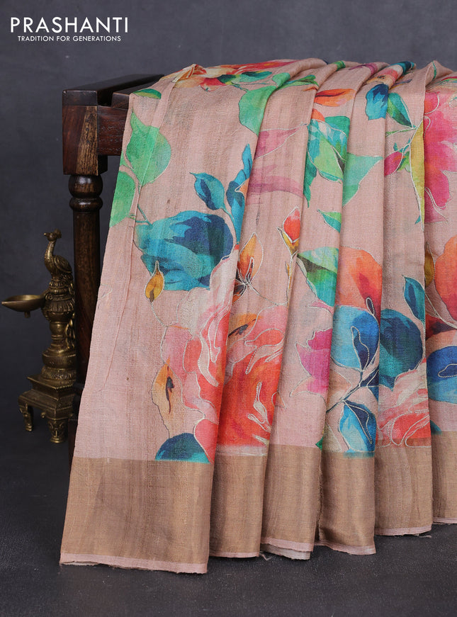 Pure tussar silk saree pastel peach with allover floral prints & pita work and zari woven border
