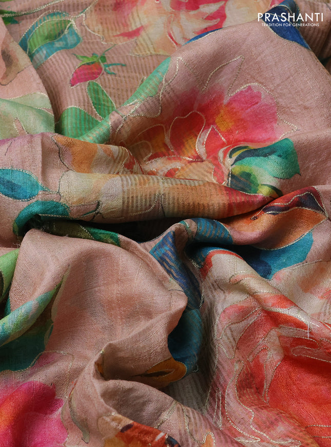 Pure tussar silk saree pastel peach with allover floral prints & pita work and zari woven border