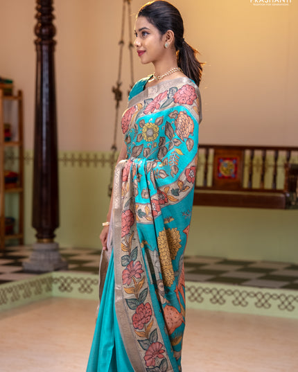 Linen tussar partly saree teal blue and pista green pastel green with kalamkari prints and zari woven border