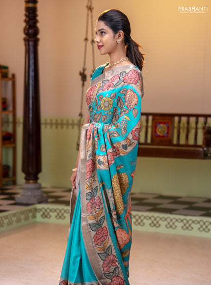 Linen tussar partly saree teal blue and pista green pastel green with kalamkari prints and zari woven border
