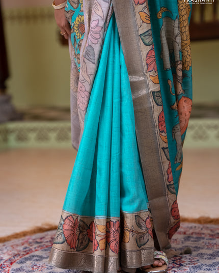 Linen tussar partly saree teal blue and pista green pastel green with kalamkari prints and zari woven border