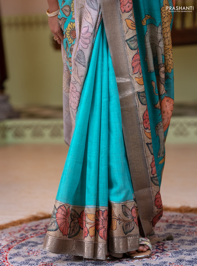 Linen tussar partly saree teal blue and pista green pastel green with kalamkari prints and zari woven border