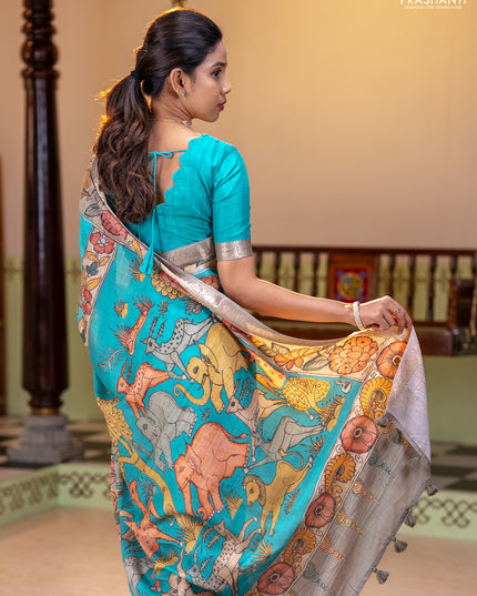 Linen tussar partly saree teal blue and pista green pastel green with kalamkari prints and zari woven border