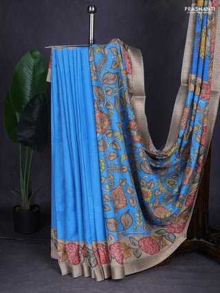 Linen tussar partly saree blue and pastel green with kalamkari prints and zari woven border