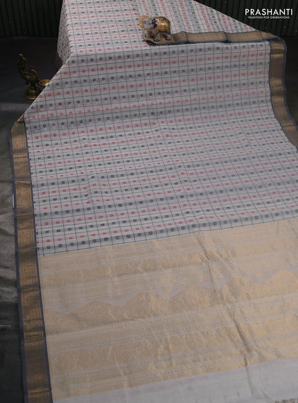 Kanchi cotton saree off white and grey with allover thread checks & buttas and zari woven border