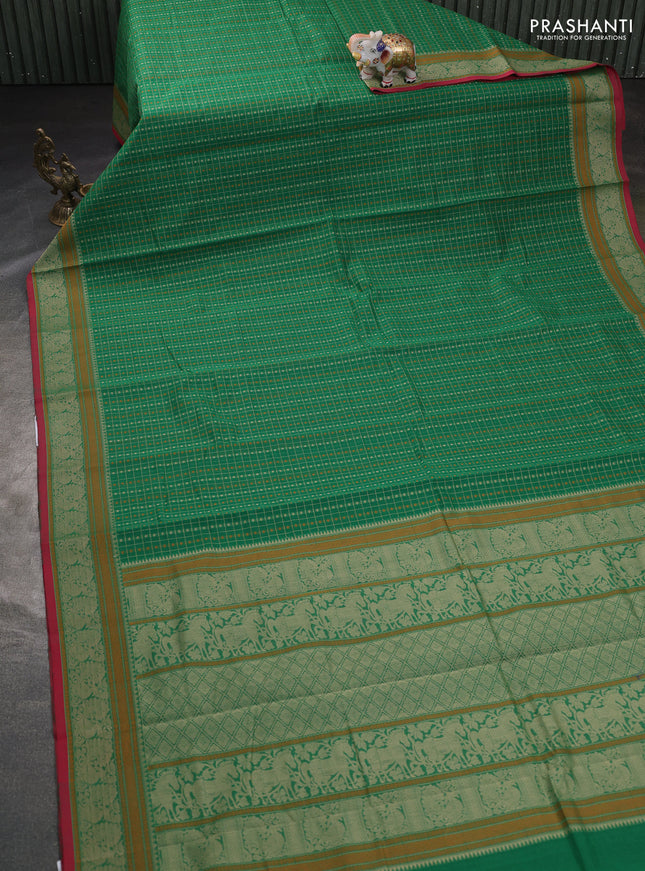 Kanchi cotton saree green and red with allover thread checks & buttas and thread woven border