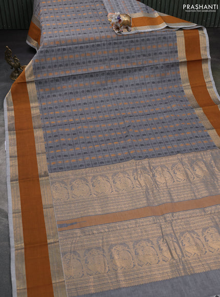 Kanchi cotton saree grey and mustard yellow with allover thread checks & buttas and rettapet zari woven border